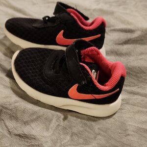 Nike Kids Black Sneakers with Pink Accents